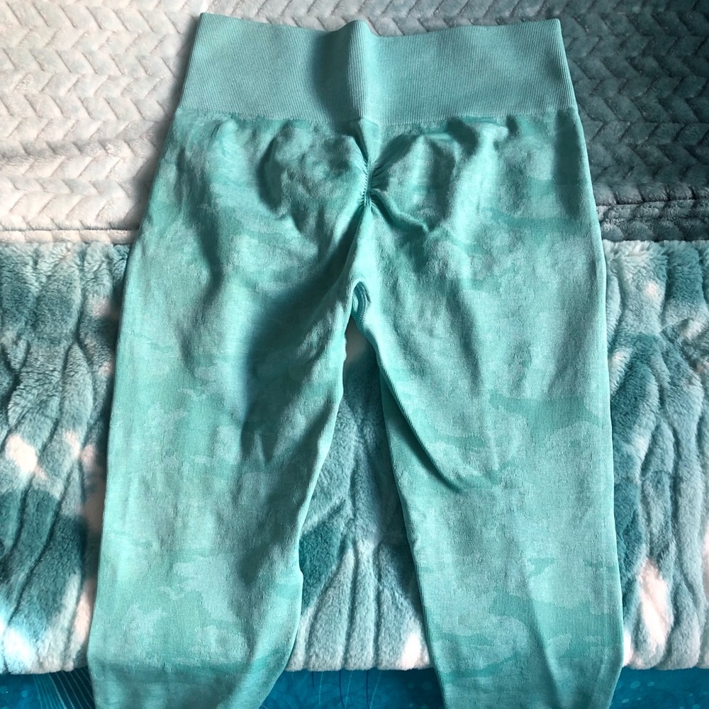 Camo turquoise gym shark leggings. Never been worn!